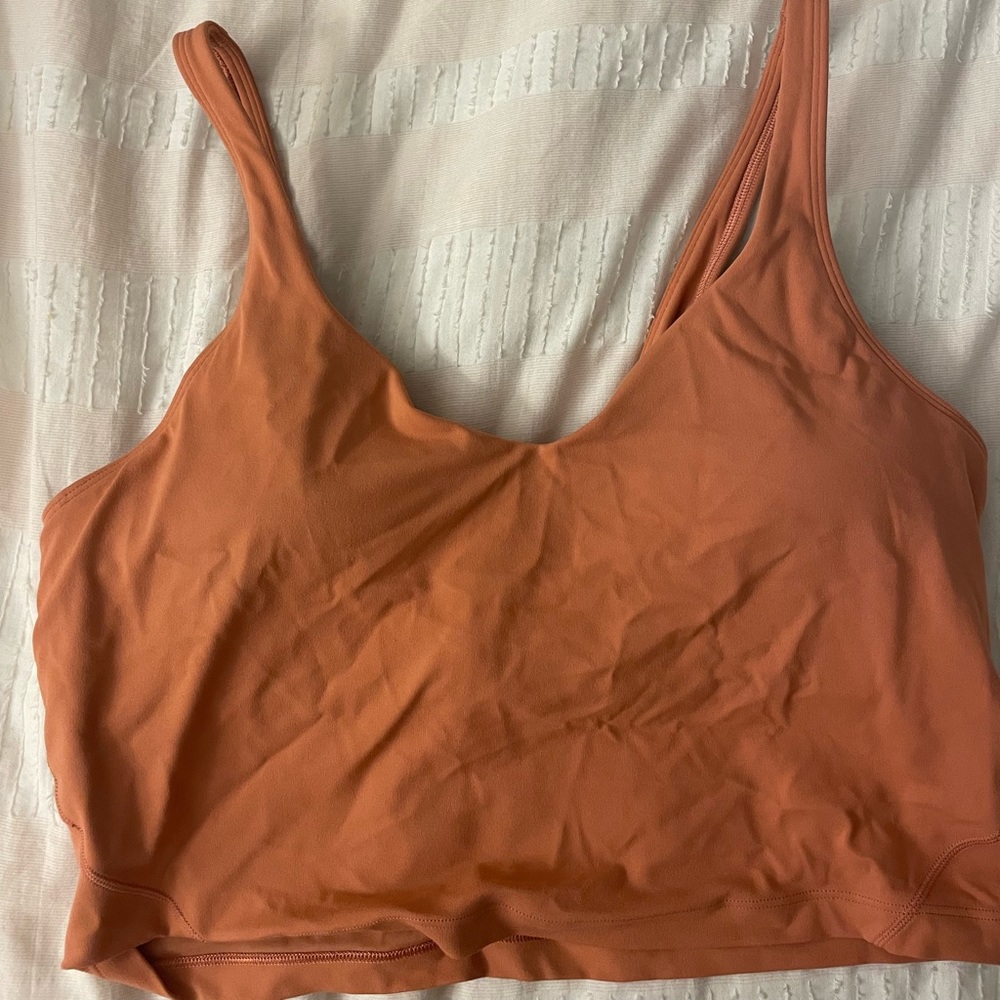 Lululemon Align Tank in an orange/brown color.